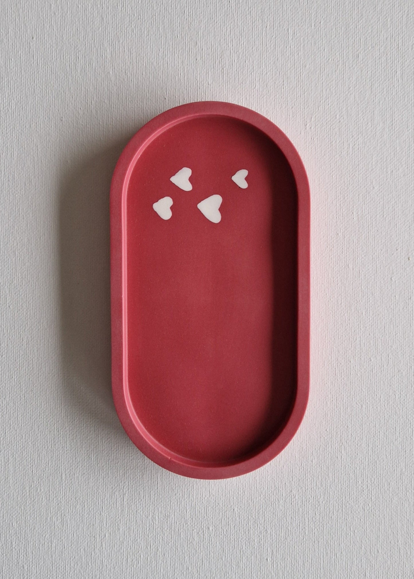 The Oval, Raspberry red with white hearts