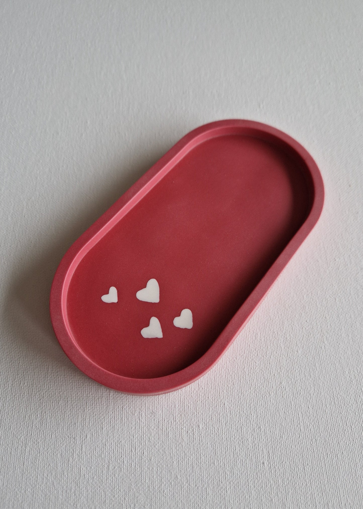 The Oval, Raspberry red with white hearts