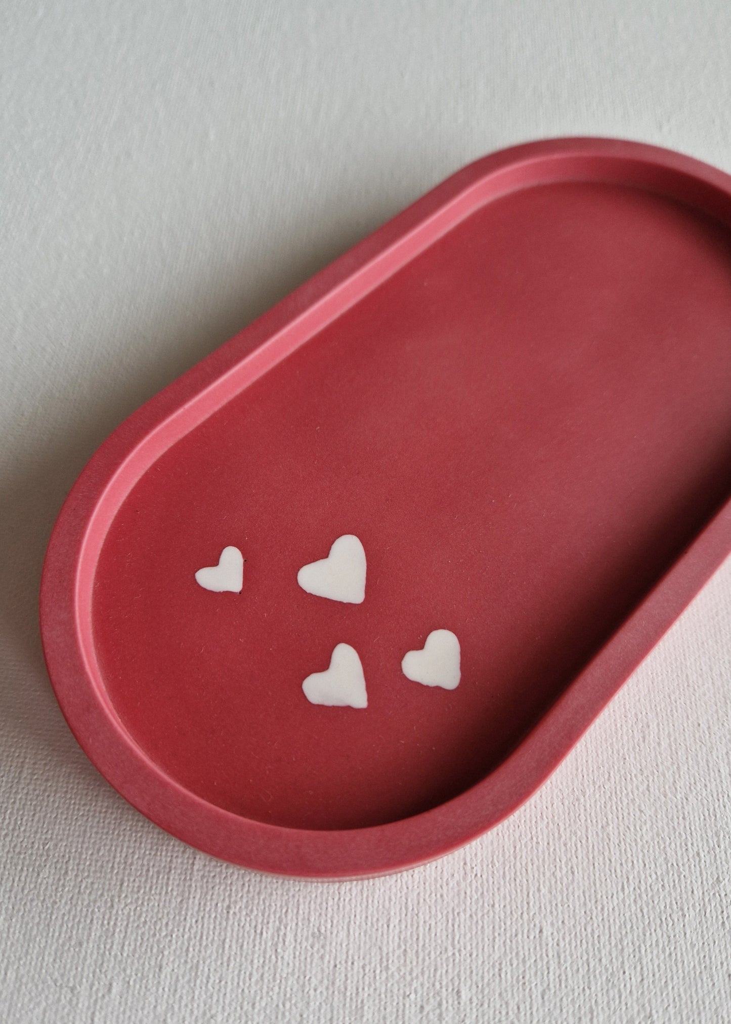 The Oval, Raspberry red with white hearts