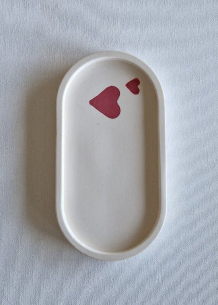 The Oval, Cream with raspberry hearts