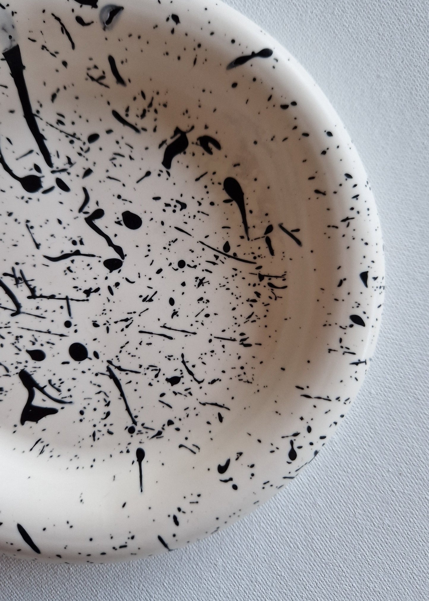 The Orb, White with black splatter